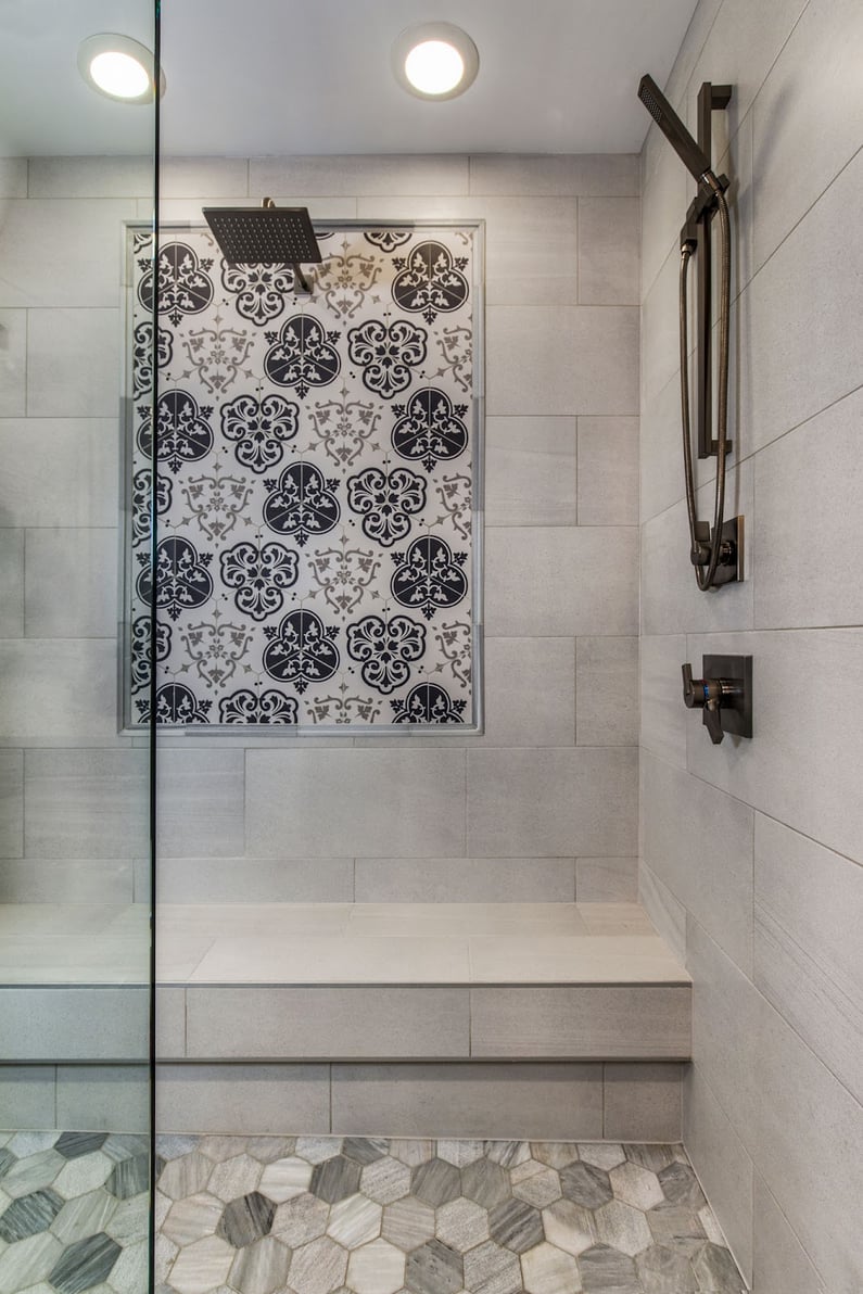 https://www.creekstonedesigns.com/hs-fs/hubfs/Blog_Images/Master-Bath-Walk-in-Shower-with-Akdo-Heritage-Tile-Accent-and-Statements-Cemento-Bianco.jpg?width=795&name=Master-Bath-Walk-in-Shower-with-Akdo-Heritage-Tile-Accent-and-Statements-Cemento-Bianco.jpg