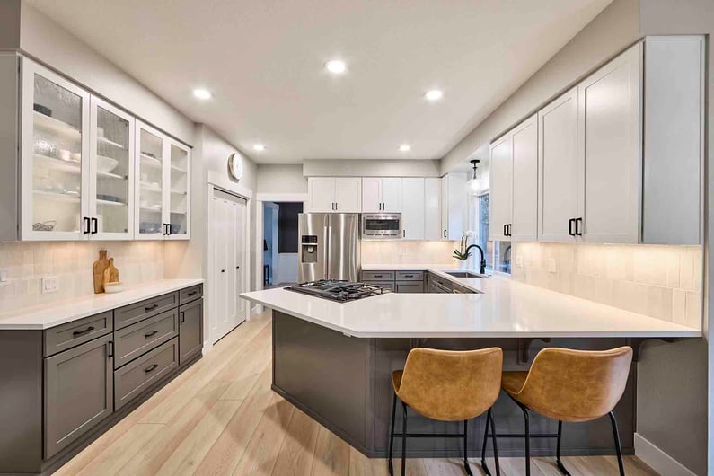 Remodeled kitchen with neutral tones by Creekstone Design + Remodel in Portland, OR