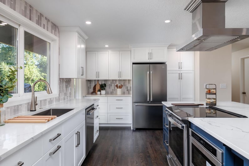 Custom remodeled kitchen in Portland, OR featuring tile backsplash and stainless steel appliances