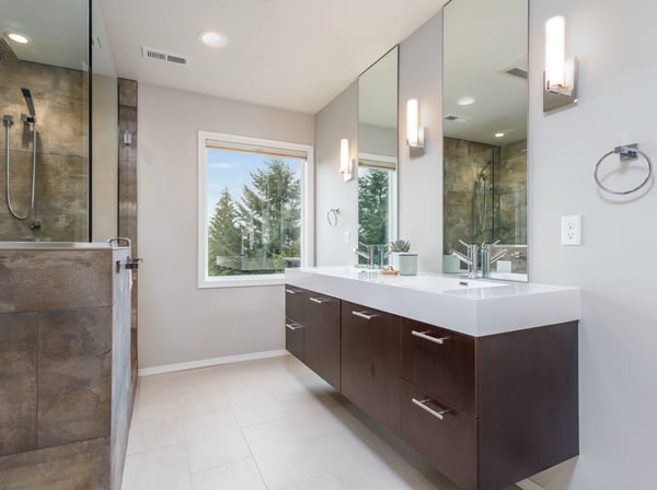 Modern bathroom tile shower floating vanity double undermount sinks light tile floor with radiant heat