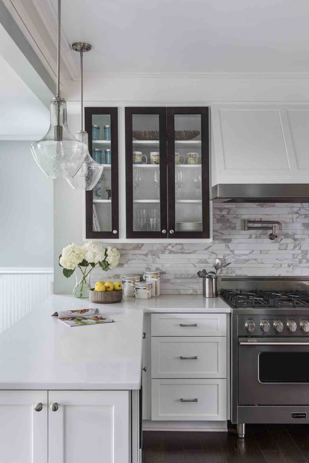 other countertop in kitchen with blakc trimmed cabinets