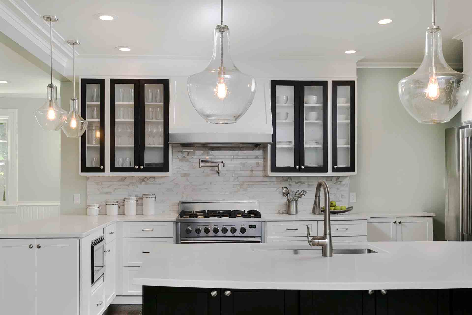 Breakfast bar with stove and hood in the background