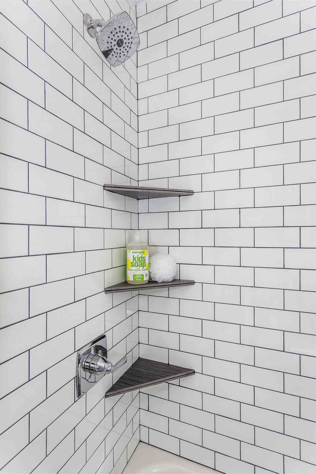 Tiled shower with shelves