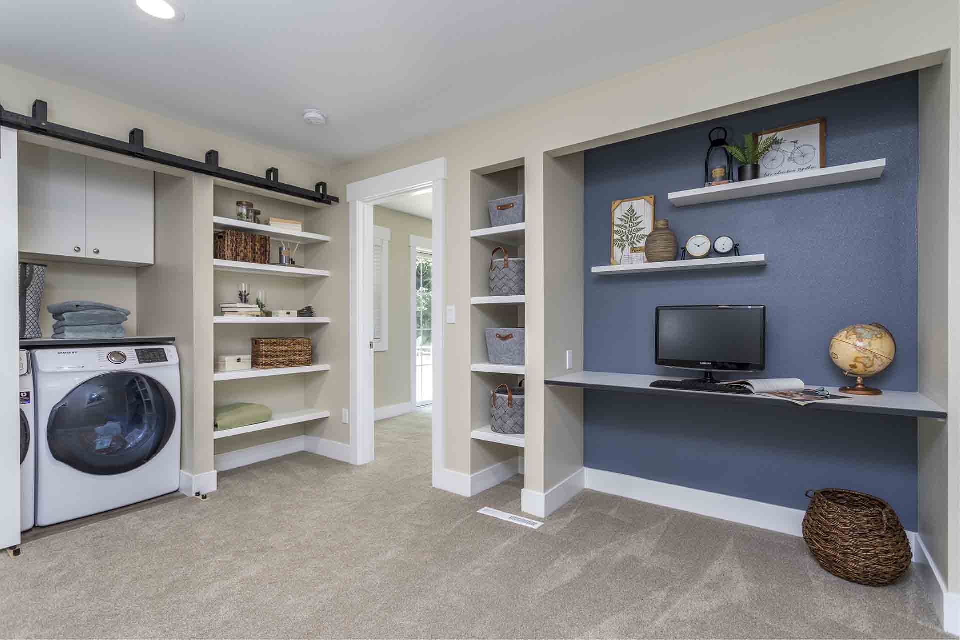 work area with laundry machines