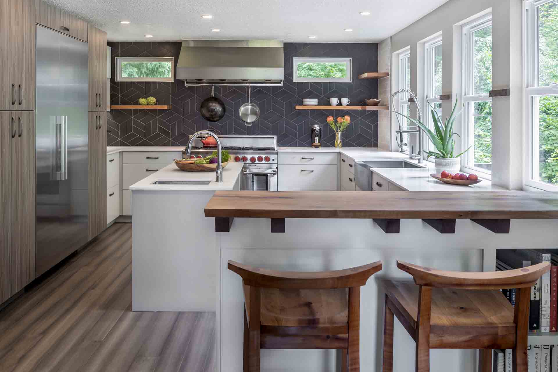 view of kitchen with breakast bar in front and the rest of kitchen behind