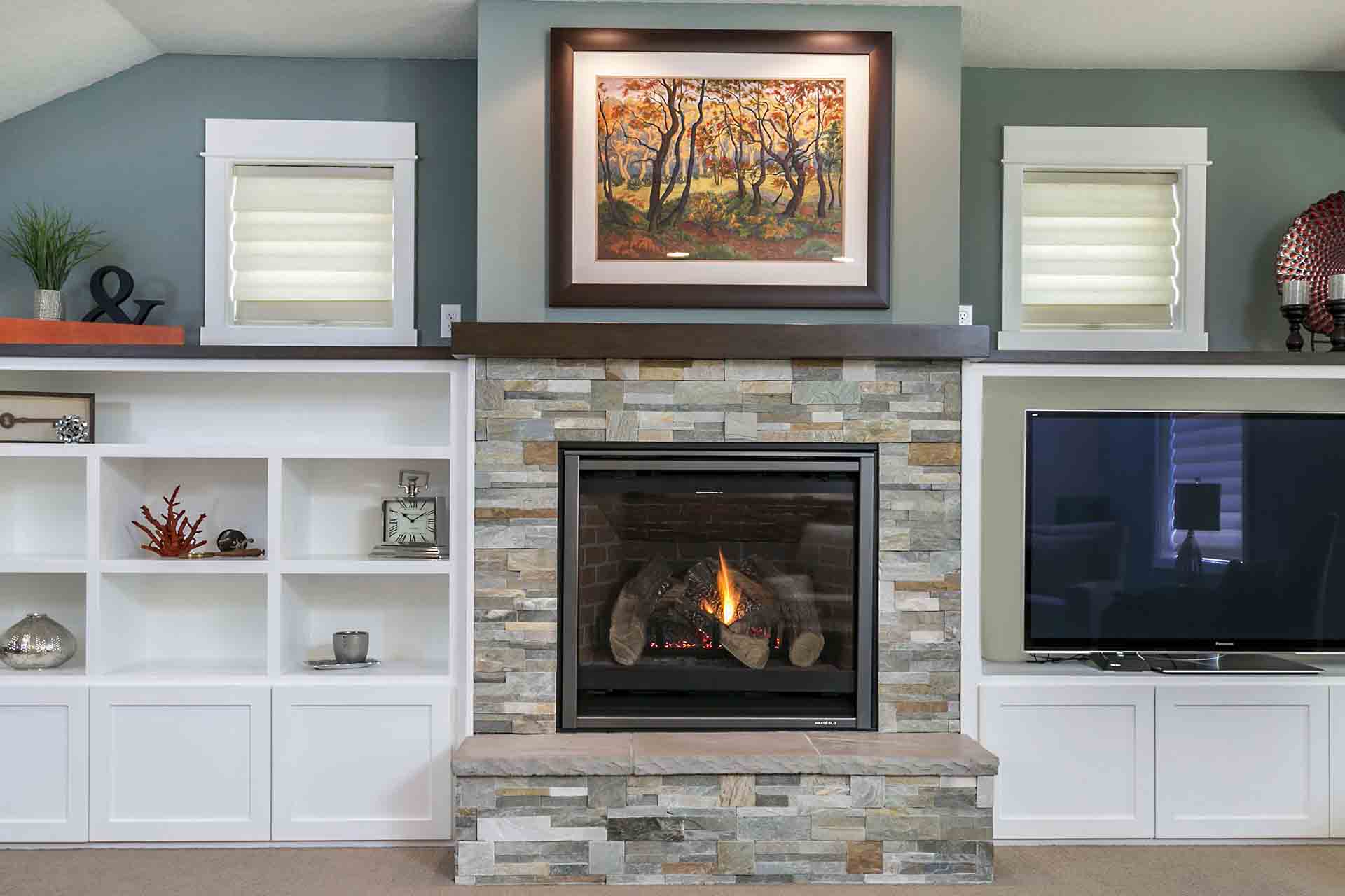 fireplace with shelving and tv