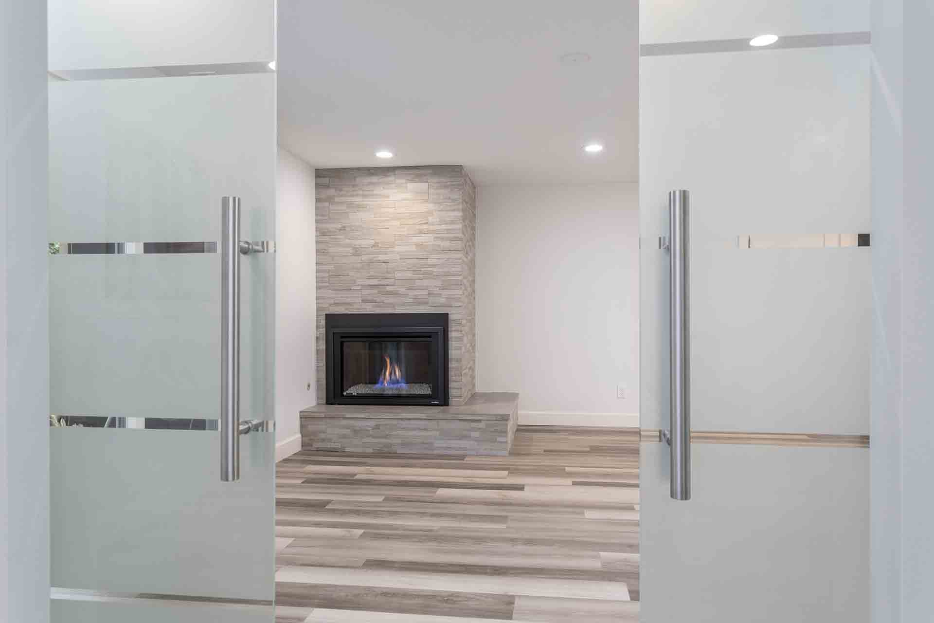 Bedroom looking toward basement fireplace