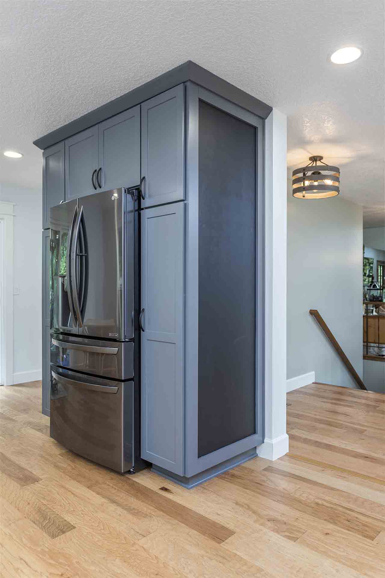 Fridge and pantry with chalkboard 