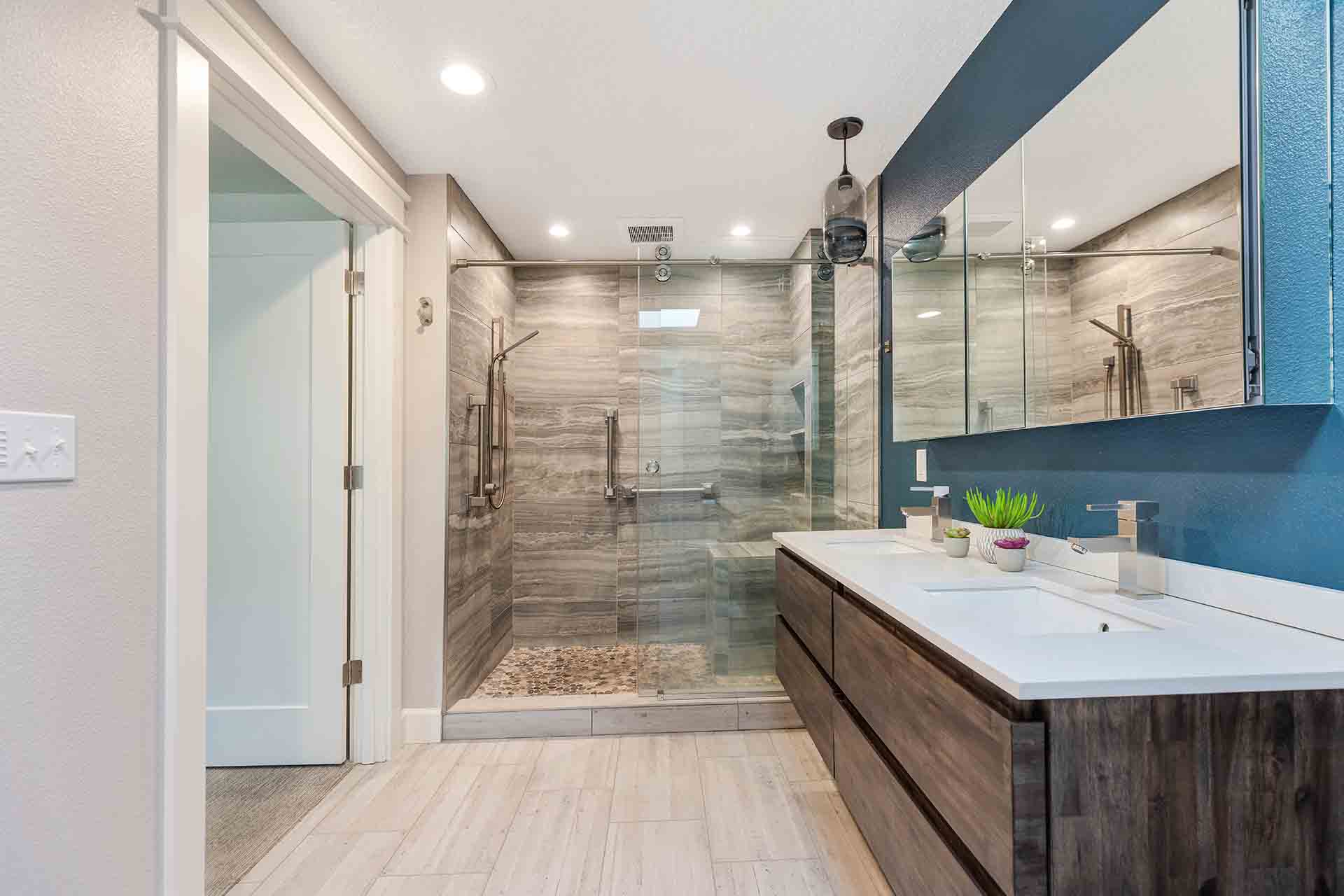 Side profile of floating vanity with shower in background