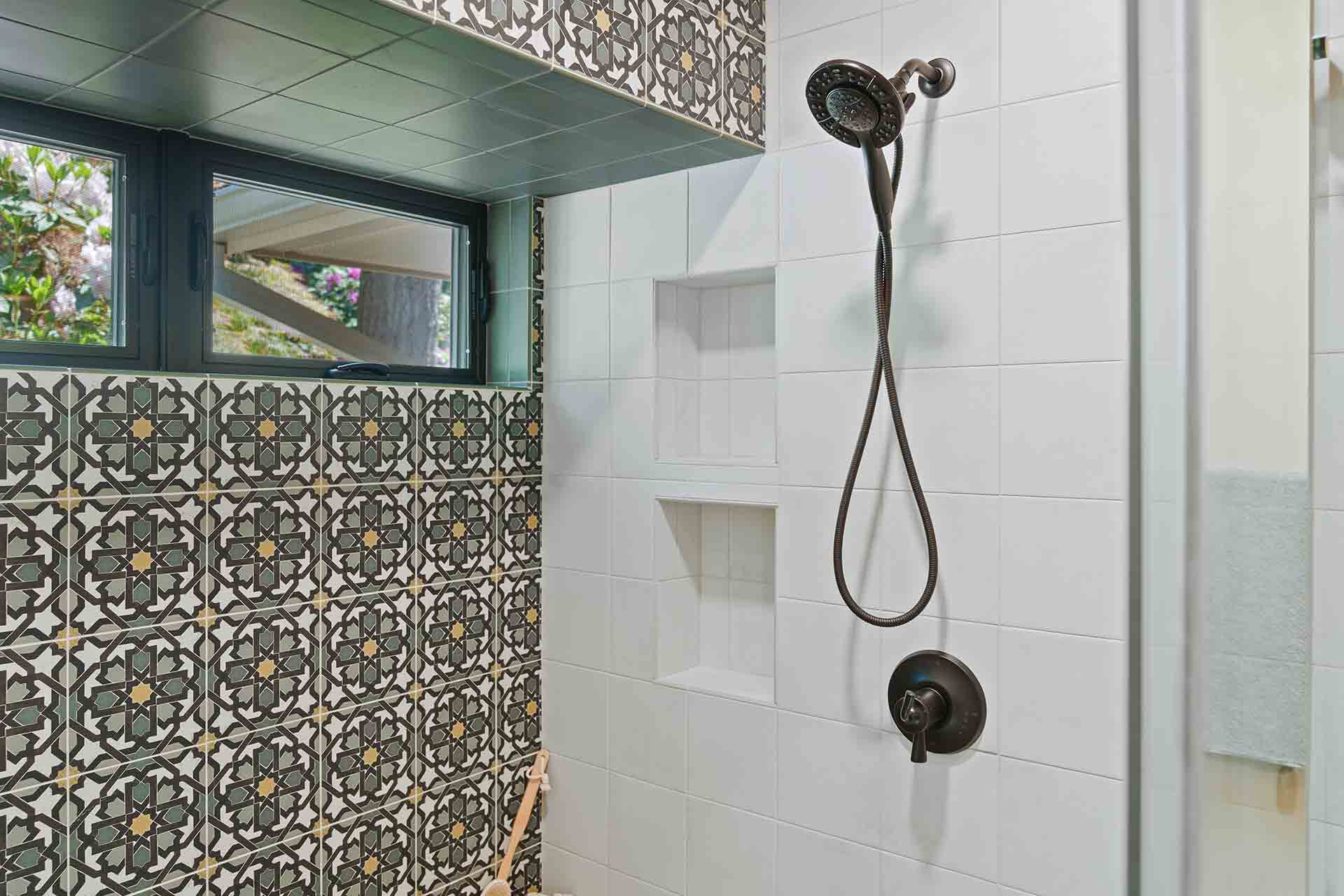 shower head and tile work